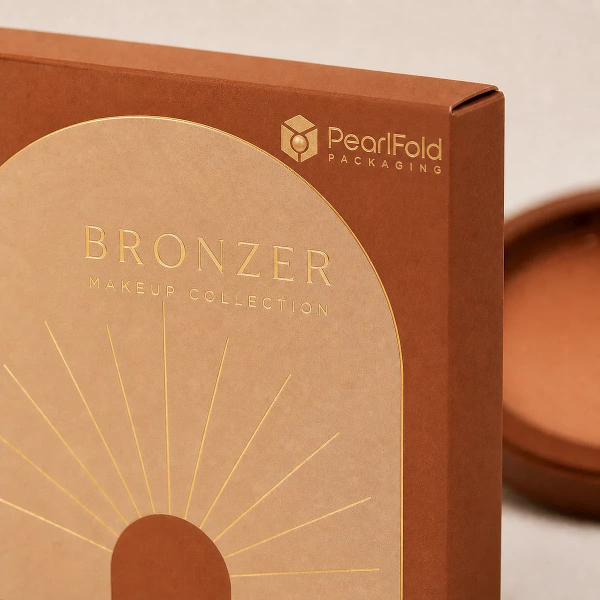 Close-up of custom bronzer box paper texture, print detail, and corner construction