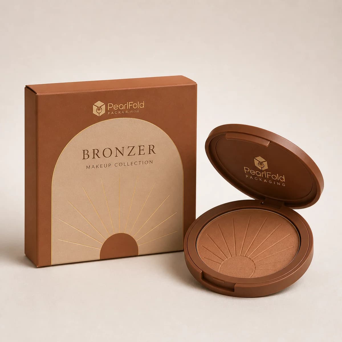 Custom bronzer box with matching product in a square studio photograph